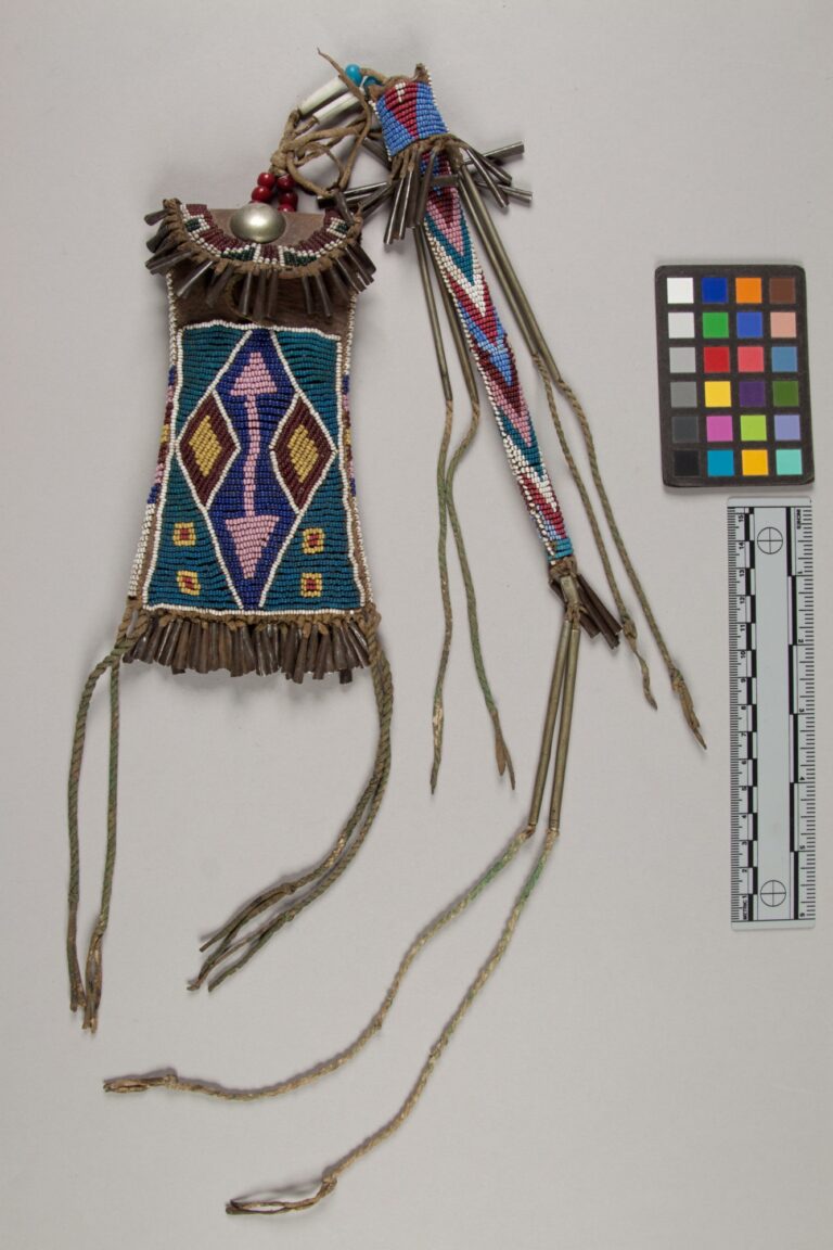 A beautiful Kiowa strike a light bag with a hair parter cover. NMNH.