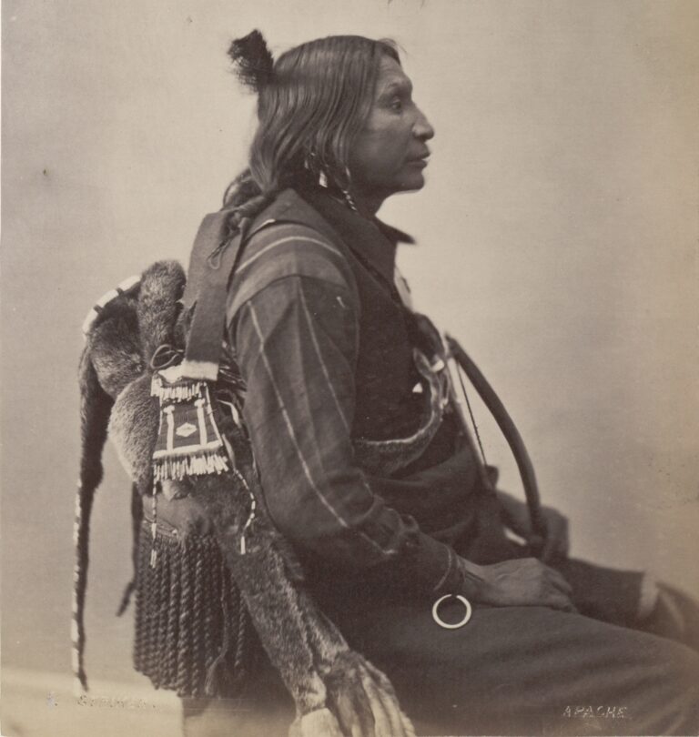An Apache warrior in Alexander Gardner's 1872 photo. On his back is an otter fur quiver with an attached strike and light bag. These bags usually contained fire-making supplies, but also spare bowstrings.