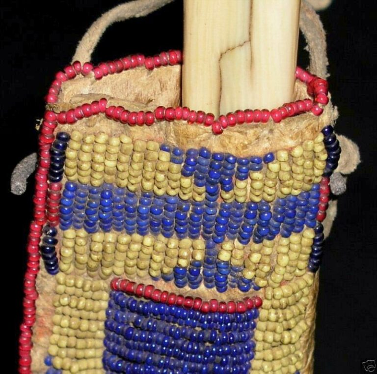 A Lakota toy knife sheath. A nice example of greasy yellow seed beads.